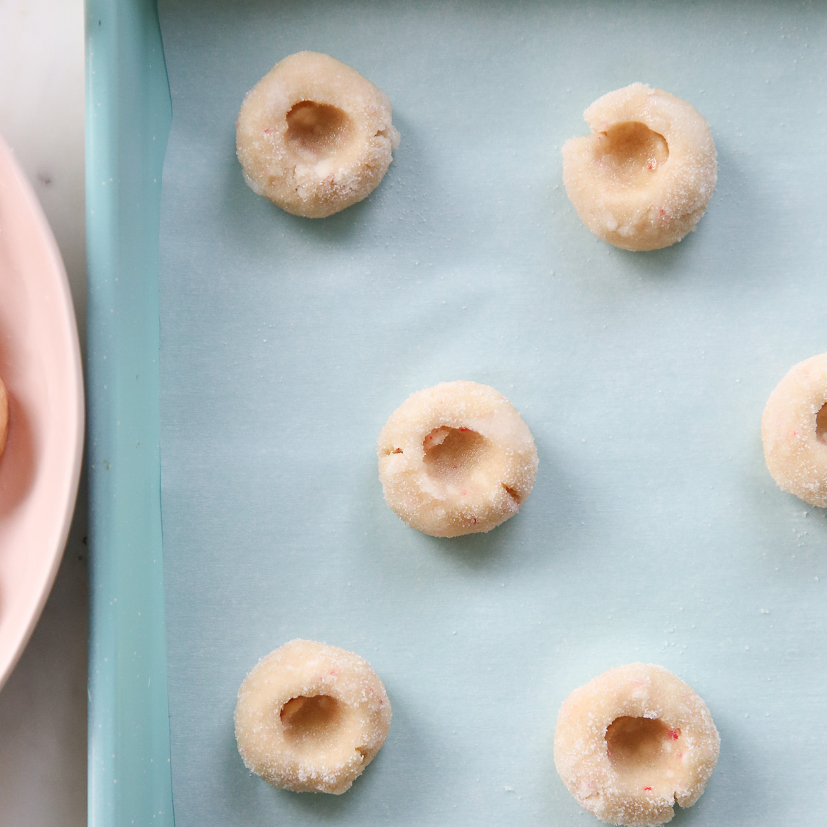 cookie dough with indentations in the middle