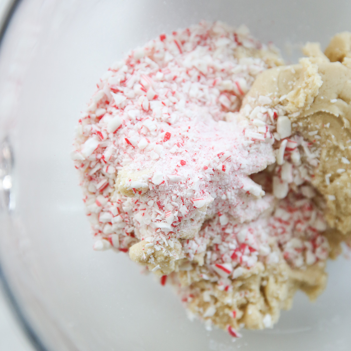 crushed candycane over dough