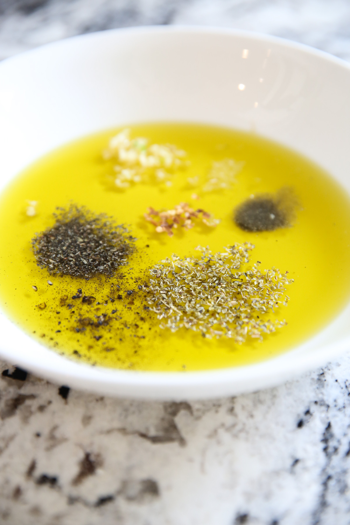 spices in a shallow bowl of oil