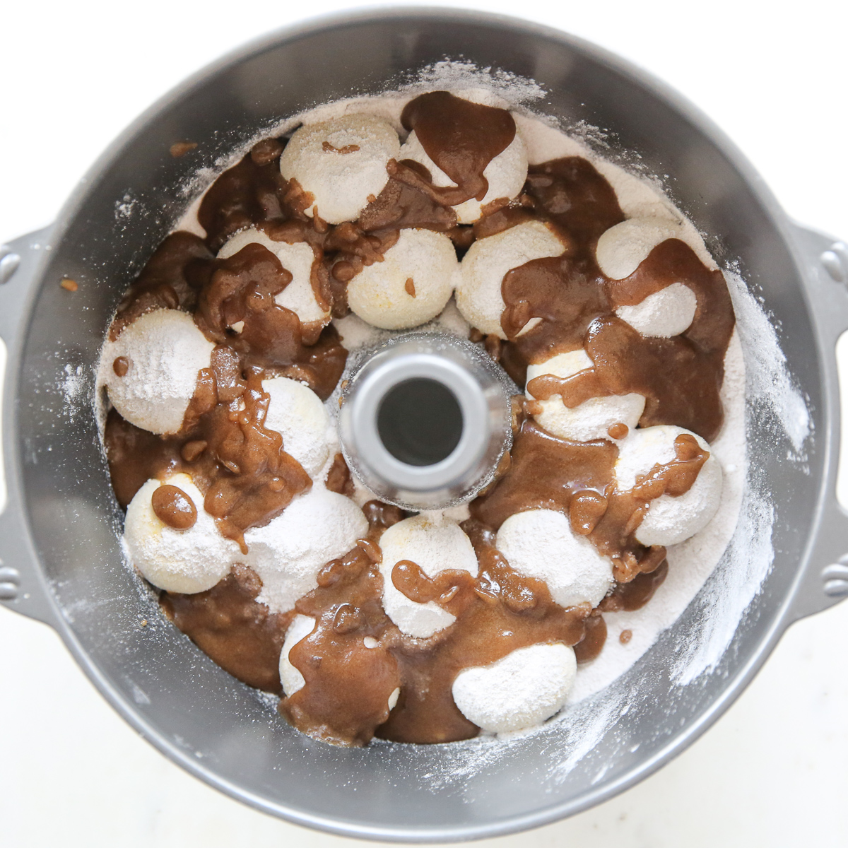 overnight caramel sticky buns before baking in a bundt pan