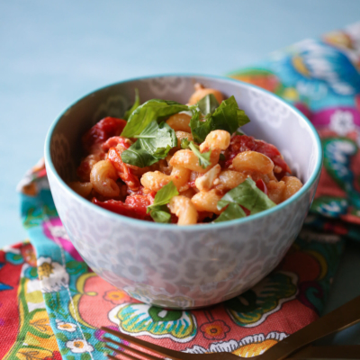 fresh tomato and feta pasta in a bowl from our best bites