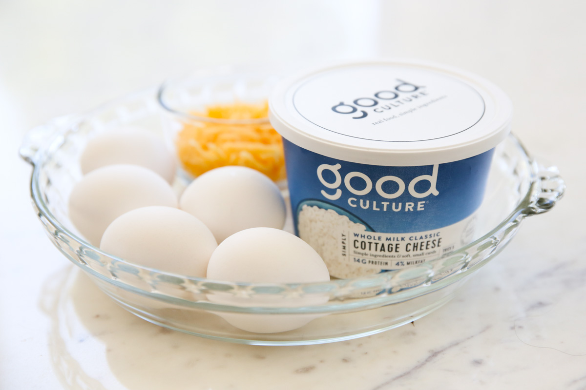 eggs cheese, and cottage cheese in a pie plate