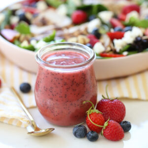 berry poppyseed vinaigrette in glass jar