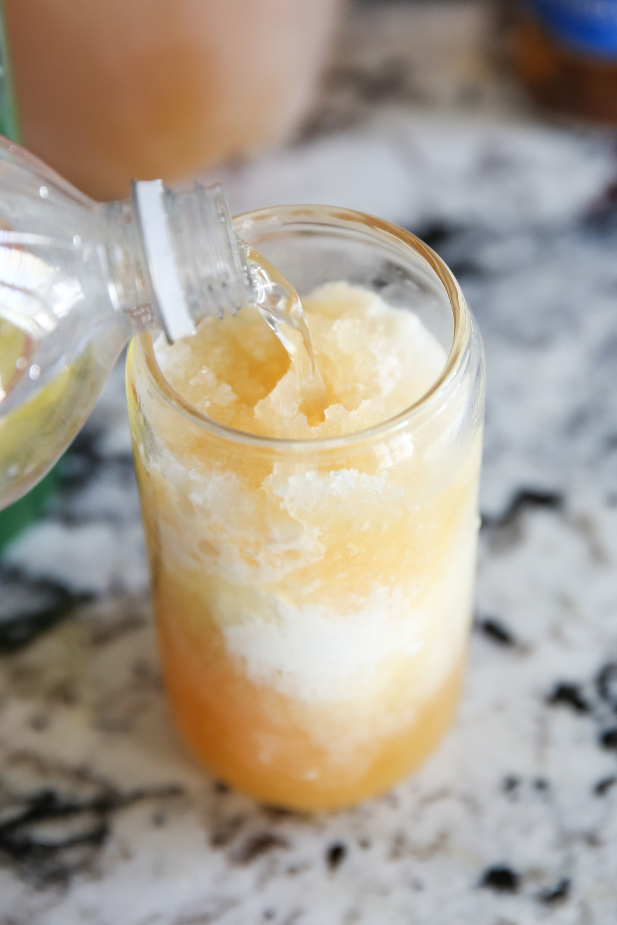 pouring soda into cup