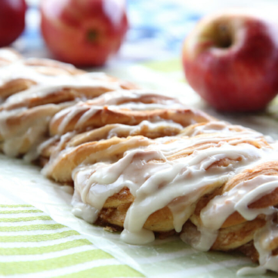 Cinnamon-Apple Twist Bread on wax paper on a table