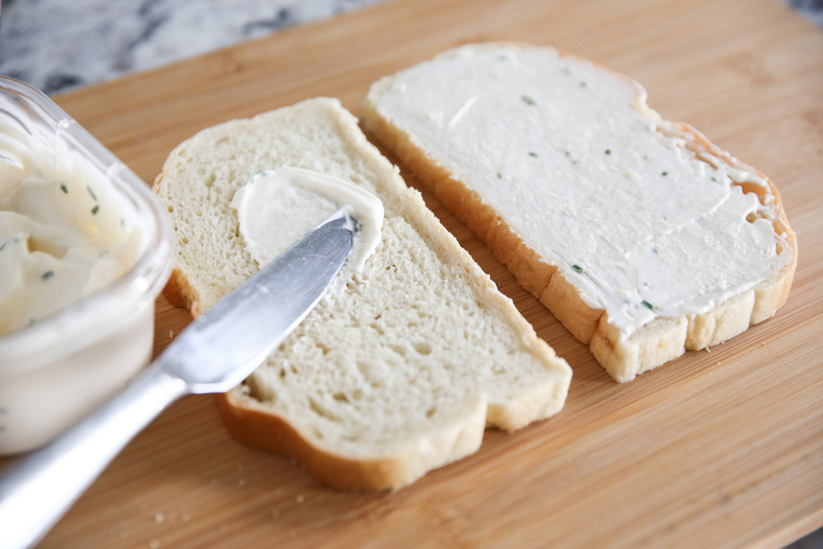 spreading mayo on bread