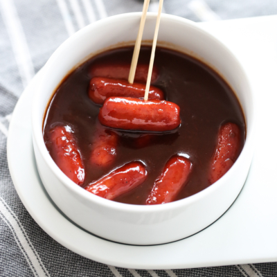 Sweet and Sour Little Smokies in a bowl with toothpicks