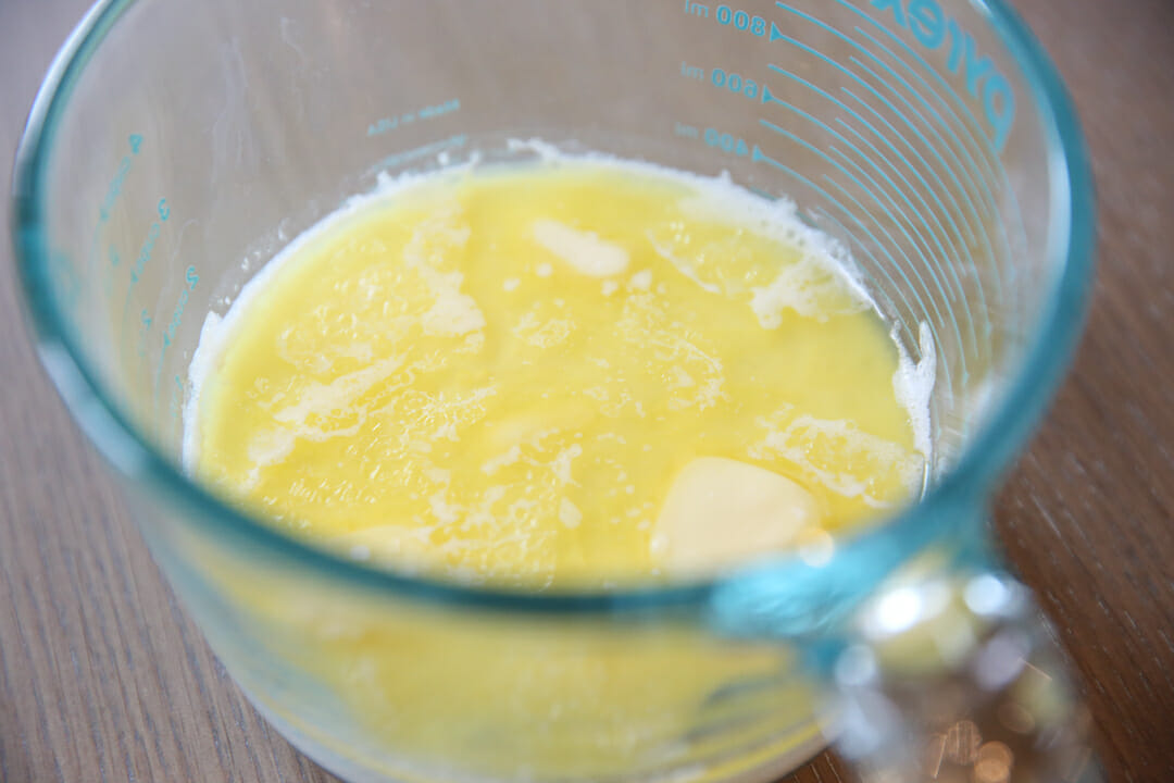 Scalded Milk and Butter in Glass Cup