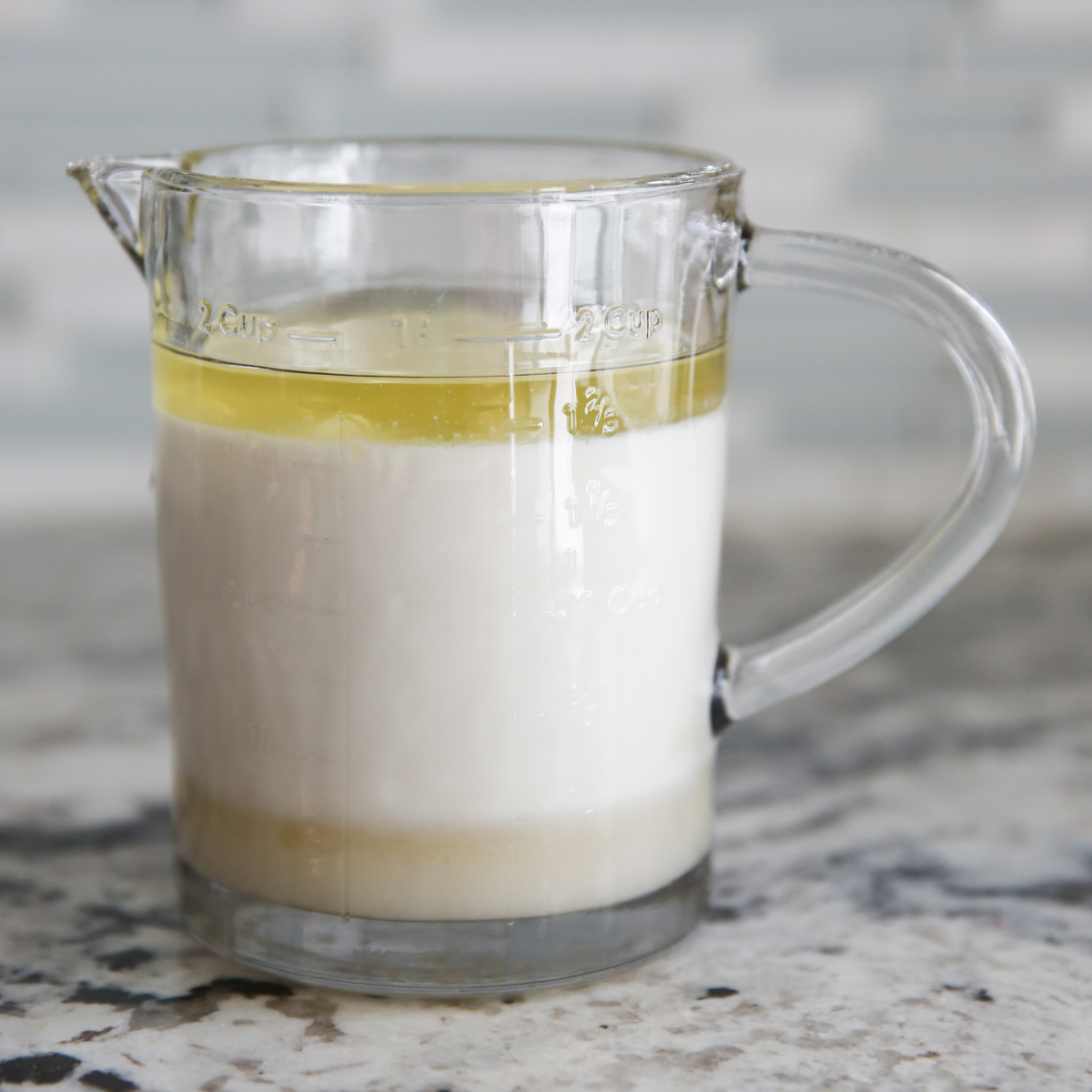 wet ingredients in a measuring cup