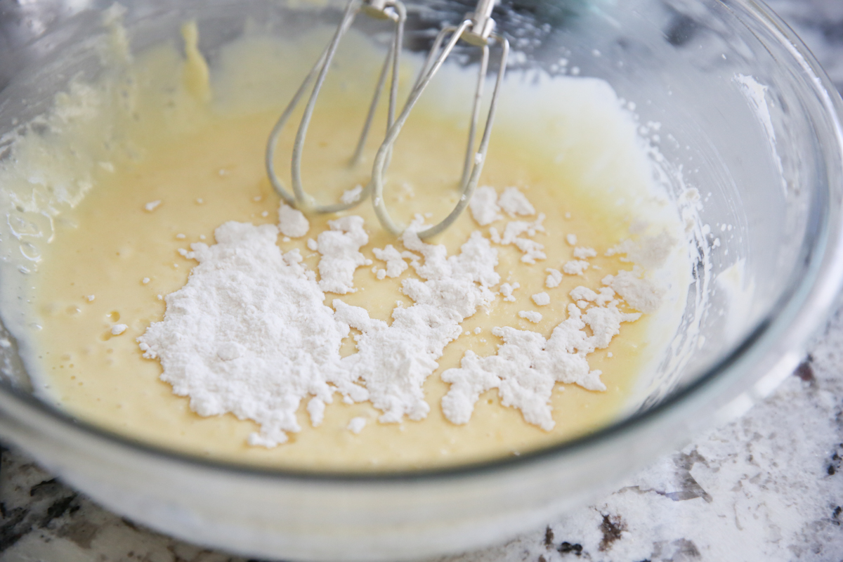 mixing dry ingredients into batter