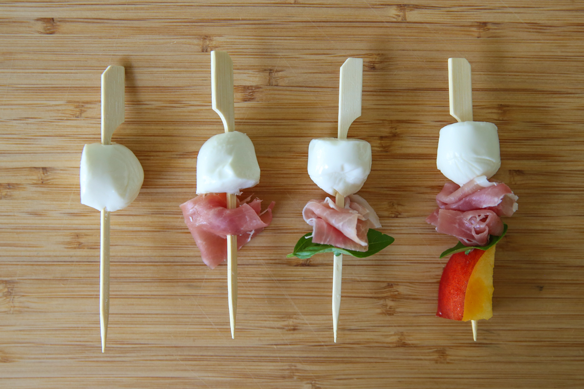 making peach mozzarella skewers